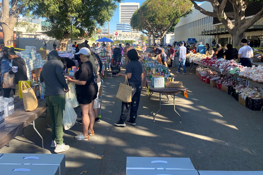 Guests picking up items at our Mercado